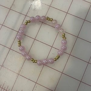 purple pearl and gold bracelet